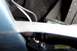 1992 Mercury Grand Marquis - Looking up into the bumper/front facia, on drivers side. The back of foglight mount is visible (black @ bottom), and th…