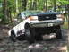 1991 Ford Bronco - This 1991 Ford Bronco is tackling a rocky off-road course in a wooded area.