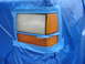 1992 Ford Explorer - The headlight and turn signal assembly of a 1992 Ford Explorer is covered with blue sheeting and taped for protection.