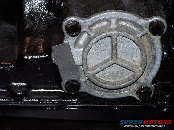 100_2696.jpg I'm using a Ford  "S" servo, the original servo apply lever, and a 2 inch wide TCS Kevlar intermediate band.

The "R" servo is slightly larger, but I couldn't find one quickly. this used "S" servo cover was $65 with a brand new piston and gaskets from my local Mister Transmission store.