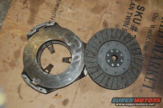 Clutch disc and pressure plate assembly on cardboard