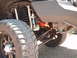 2005 Ford F-250 - Front suspension components and tire of a heavy-duty truck, Fox shocks.
