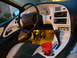 1995 Ford Thunderbird - Interior view of a 1995 Ford Thunderbird, highlighting the dashboard and console.