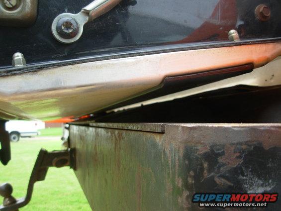 tg15.jpg The rubber pad on the bumper lid is now barely touching the t/g trim panel, just like when I installed the t/g ~7 years ago, and the cables are tight.
