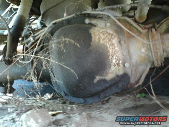 Rear axle and suspension parts of a vehicle