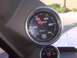 1995 Ford Bronco - Vehicle interior with Cobalt oil pressure and temperature gauges. The oil pressure reads 40 PSI.