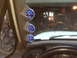 1995 Ford Bronco - A-pillar mounted gauges are visible inside the vehicle's cabin.