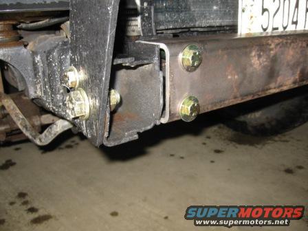 Custom steel bumper mount with hex bolts, license plate visible