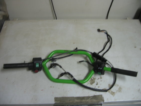 1 montain handle bars off 03 Arctic cat 800, with warmers, kill and headlamp switch. Throttle lever is missing. Mastercylinder with brake line. Brake lever is missing and brake light switch is broken - $60
