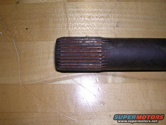 Close-up of a splined shaft end with some rust