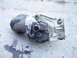 1993 Ford Probe - Windshield wiper motor assembly shown on a concrete surface. Part number visible on motor housing.