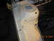 1995 Ford Taurus - Close-up of a clean, white-painted vehicle chassis, likely the engine bay, with visible wiring and hoses.