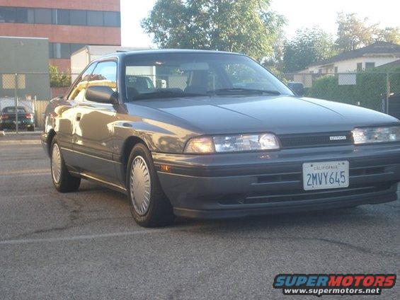 Gray 1989 Mazda MX-6 coupe, 3/4 front view