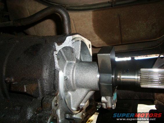 close-up of a transmission output shaft seal being installed