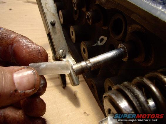 img_0019.jpg Use the plastic stem protector provided with the seals. It helps protect the seals and helps you send them all the way home, over their three inner ribs for a solid install/seating on the guide housing.