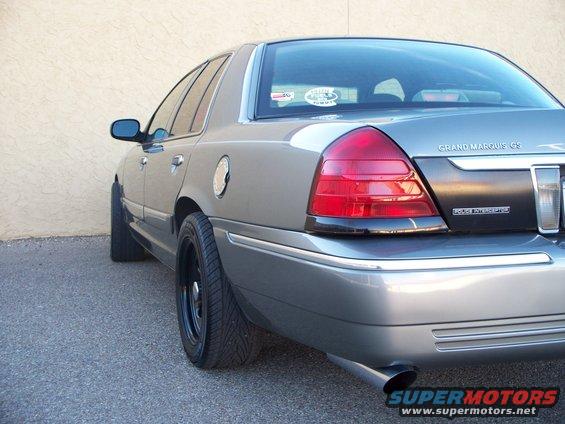 2003 Mercury Grand Marquis GS rear quarter view, showing taillight and "Police Interceptor" badge