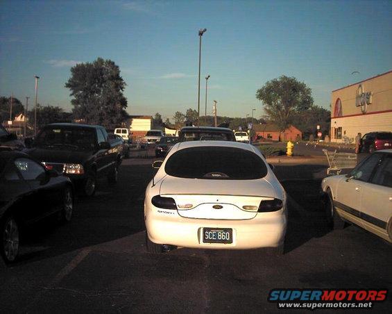 1997 Ford Taurus rear view parked in a lot, license plate SCE 860