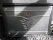 1997 Ford Crown Victoria - A Kicker ZX750.1 car audio amplifier is shown, likely installed in a vehicle's trunk.