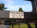 1988 Ford F-350 - Sticker on a truck rack shows company name and contact information.