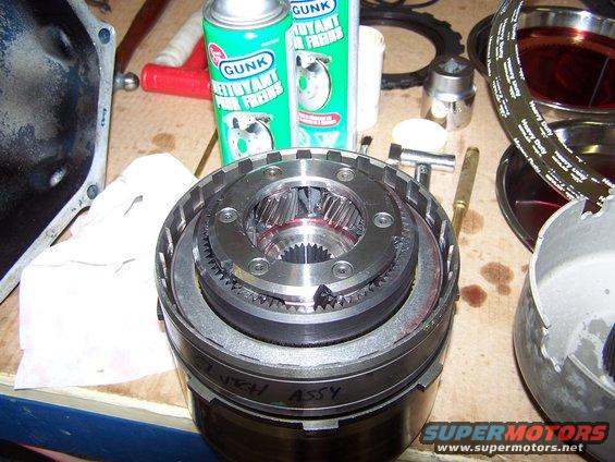 100_2767.jpg the reverse-high clutch, the forward clutch, and the planetary set all stacked up.