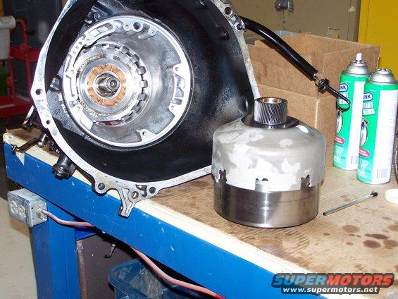 100_2773.jpg the reverse-high clutch, with the forward-clutch, the new planetary, the new sun gear and the new sun gear shell all stacked on each other and ready to be installed into the transmission case.