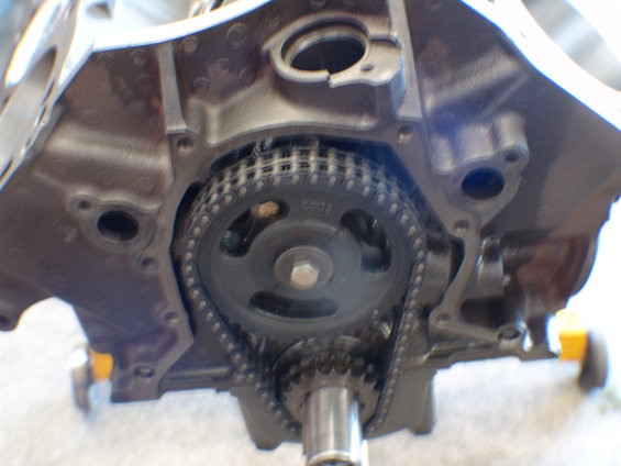 Engine block with timing chain and gears visible