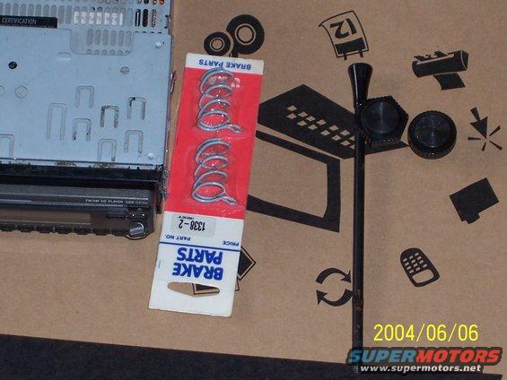 Car stereo and brake parts packaging on cardboard