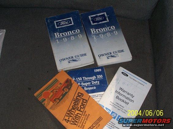 Four Ford vehicle manuals, including two 1989 Bronco Owner Guides