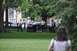 1996 Ford Bronco - Several officers are gathered around a bench in a park, attending to a person.