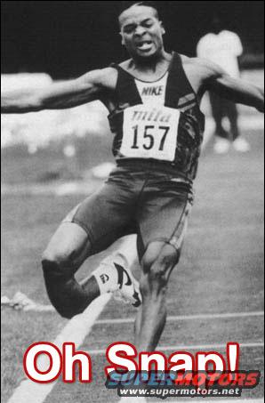 Runner with bib number 157 crossing a finish line, text overlay 'Oh Snap!'