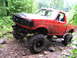 1994 Ford F-250 - This lifted 1994 Ford F-250 navigates a challenging off-road course.