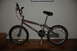 1998 BMW R1100GS ABS - A chrome BMX bicycle, possibly a Predator model, is shown parked indoors on a wooden floor.