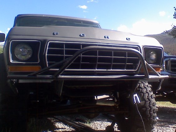 Front view of a 1978 Ford Bronco with a custom bumper and grille guard