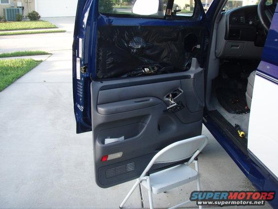 1996 Ford Bronco interior door panel removed, showing insulation