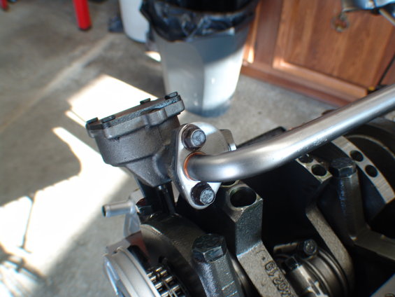 Engine oil pump assembly with pickup tube attached to crankshaft