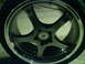2007 Volkswagen Rabbit - Close-up of a TSW wheel, a five-spoke design and a polished outer rim.