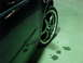 2007 Volkswagen Rabbit - Side view of a car's wheel and fender, showing aftermarket rims.