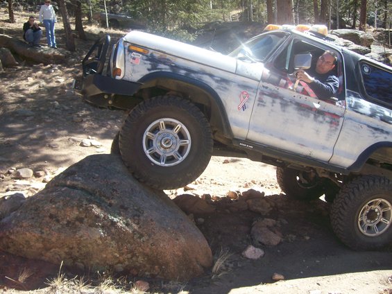 1978 Ford Bronco climbing a rock, 3q-front view