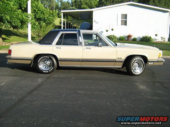 1988 Mercury Grand Marquis side view, tan with black roof