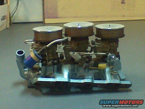Triple carburetor setup with chrome air cleaners