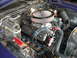 1974 Ford Ranchero - Close-up view of a modified engine bay, showing various aftermarket performance parts.