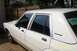 1991 Ford Crown Victoria LTD - This 1991 Ford Crown Victoria LTD is seen from the side, tinted windows and a visible registration sticker.