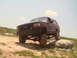 1992 Ford Bronco - This 1992 Ford Bronco is shown navigating a rocky terrain.