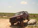 1992 Ford Bronco - This 1992 Ford Bronco is navigating a rocky obstacle during an off-road excursion.