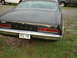 1970 Ford Falcon - Rear view of a black 1970 Ford Falcon showing its taillights and chrome bumper.
