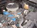 1970 Ford Falcon - Close-up view of a car's engine bay, showing the air intake and engine components.