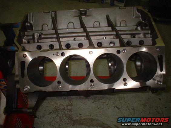 Engine block with four cylinders visible