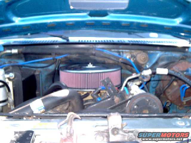 thwbronco23.jpg Front-support bracket is bolted to accessory/AC bracket at front of engine