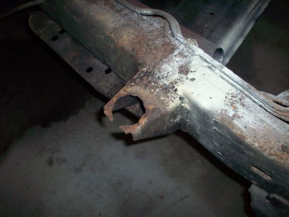 rusted frame section with a hole