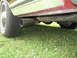 1984 Mercury Grand Marquis - Undercarriage view of a vehicle, focusing on the exhaust system and rear tire.